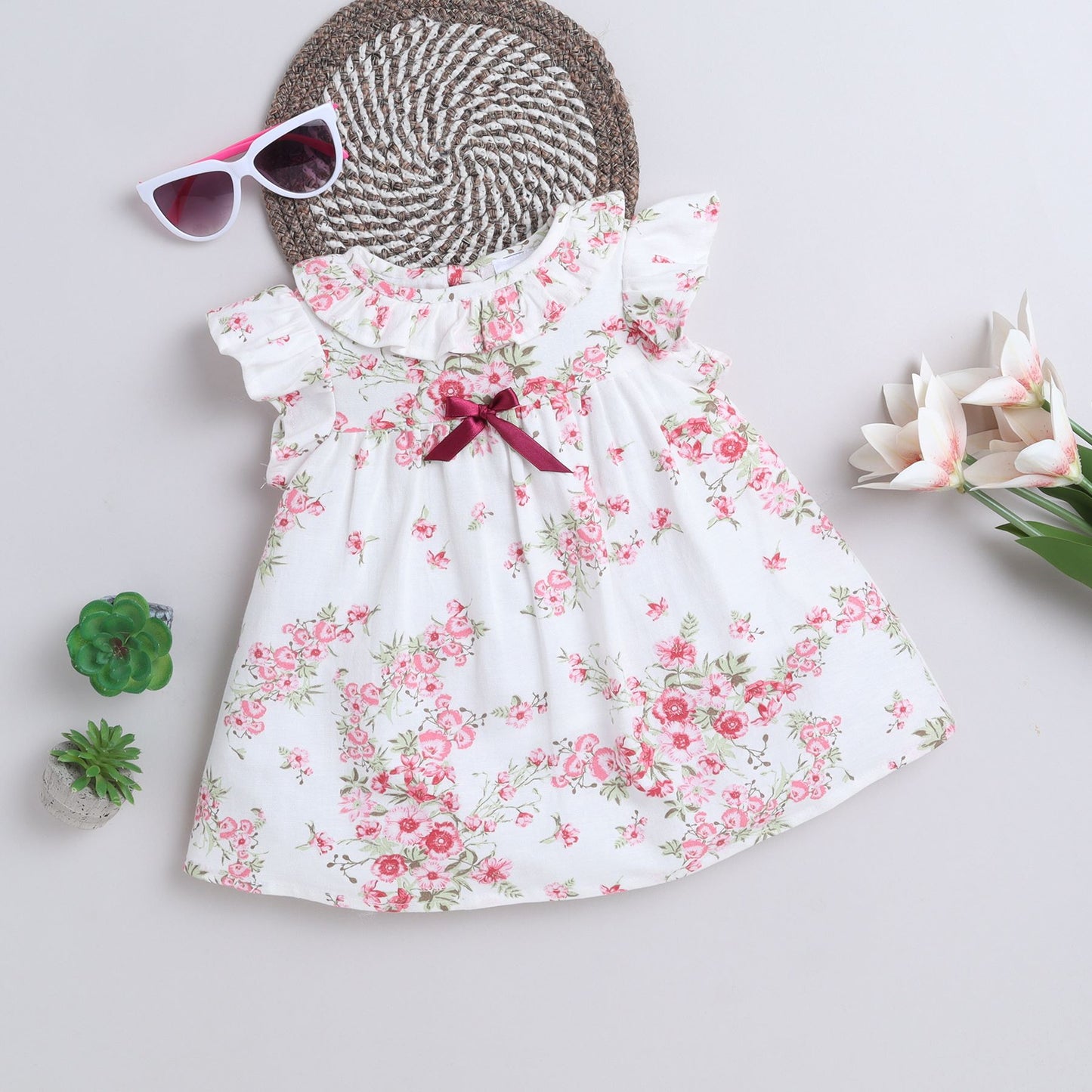 Many Frocks & cotton frill sleeves knee length floral printed baby casual dress- White &Pink