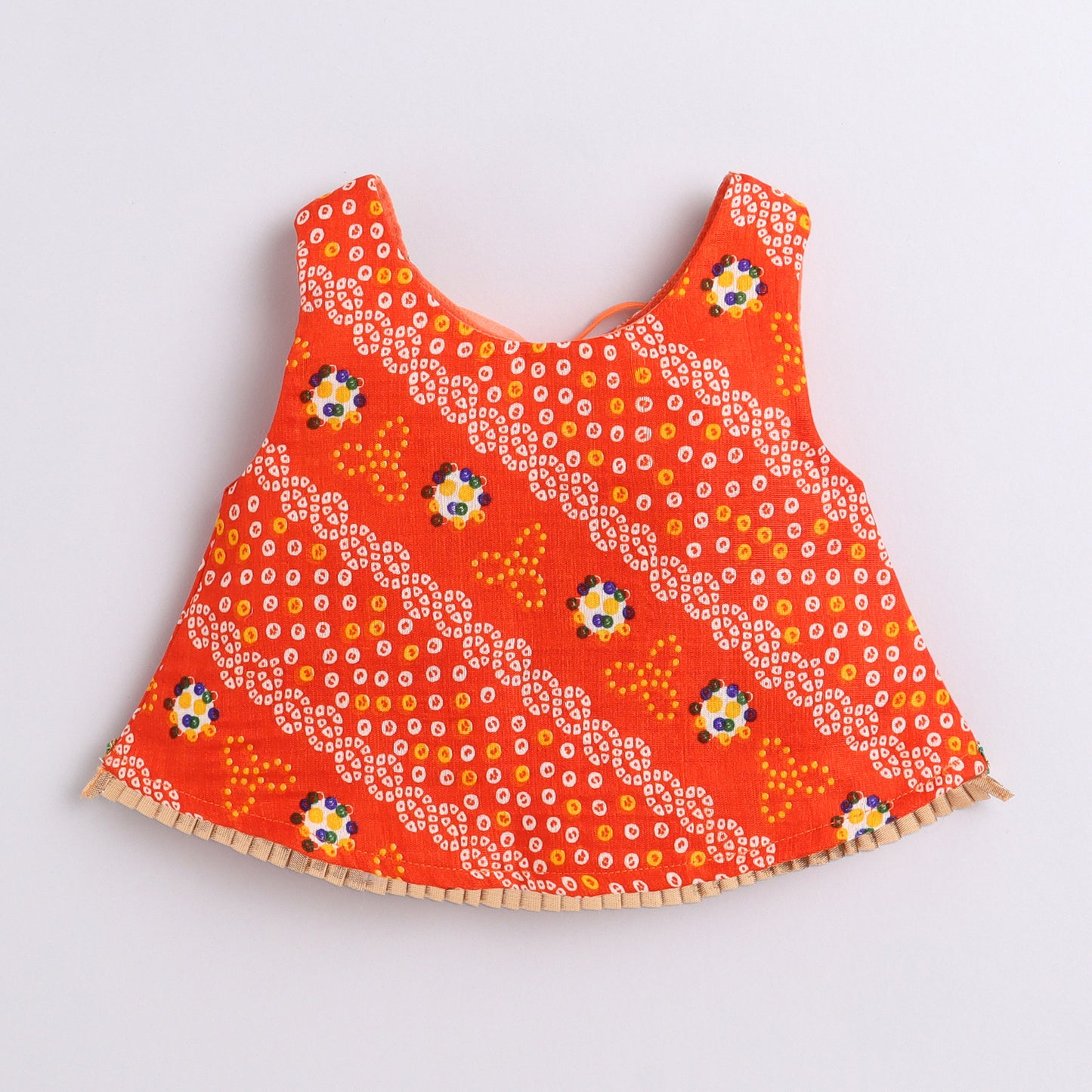 Many Frocks & satin sleeveless bandhani lace and latkan embellished dhoti top set- orange and cream