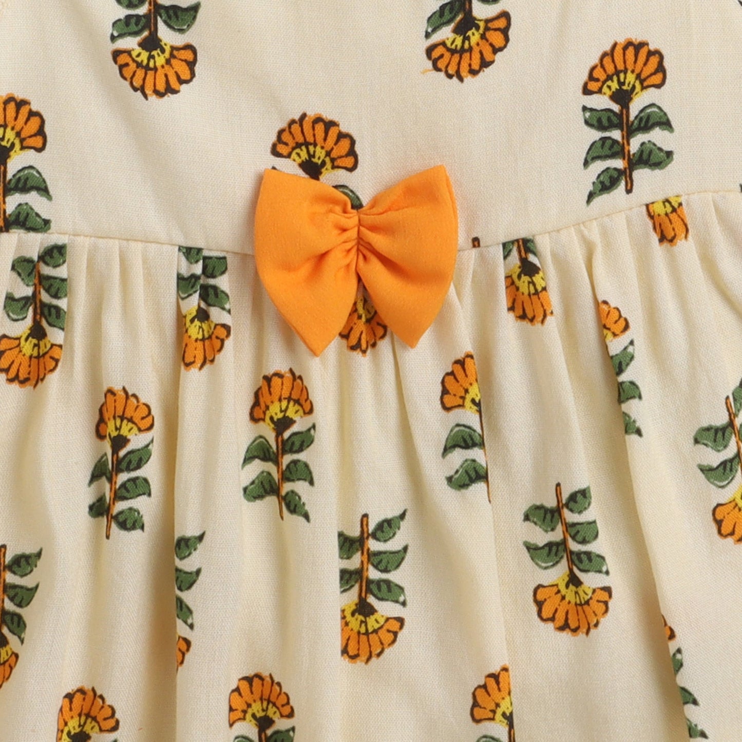 Many Frocks knee length foral printed silky textured baby dress - Yellow & Cream