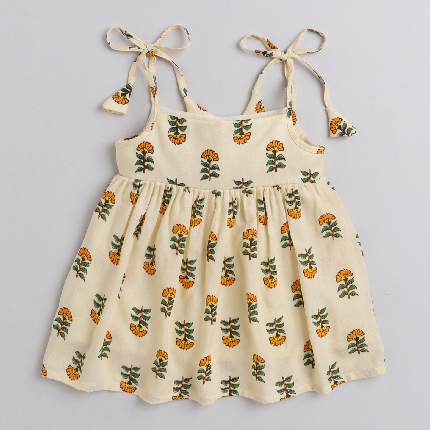 Many Frocks knee length foral printed silky textured baby dress - Yellow & Cream