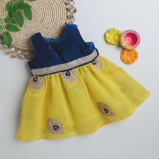 Many Frocks & Velvet Sleeveless Knee Length Lace Embellished Peacock Printed Baby Ethnic Frock - Blue & Yellow