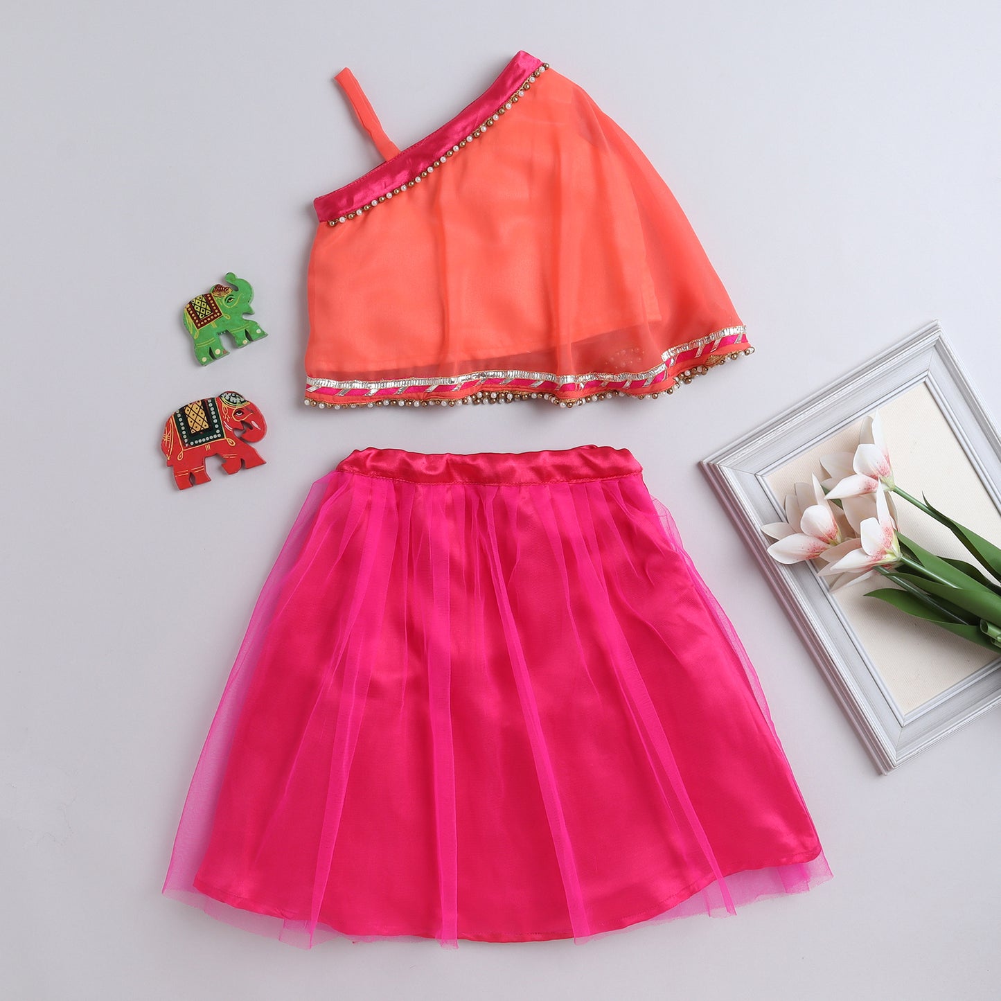 Many Frocks & Sleeveless Net One Shoulder Beaded Choli with Lehenga-Peach