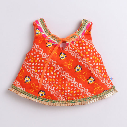 Many Frocks & satin sleeveless bandhani lace and latkan embellished dhoti top set- orange and cream