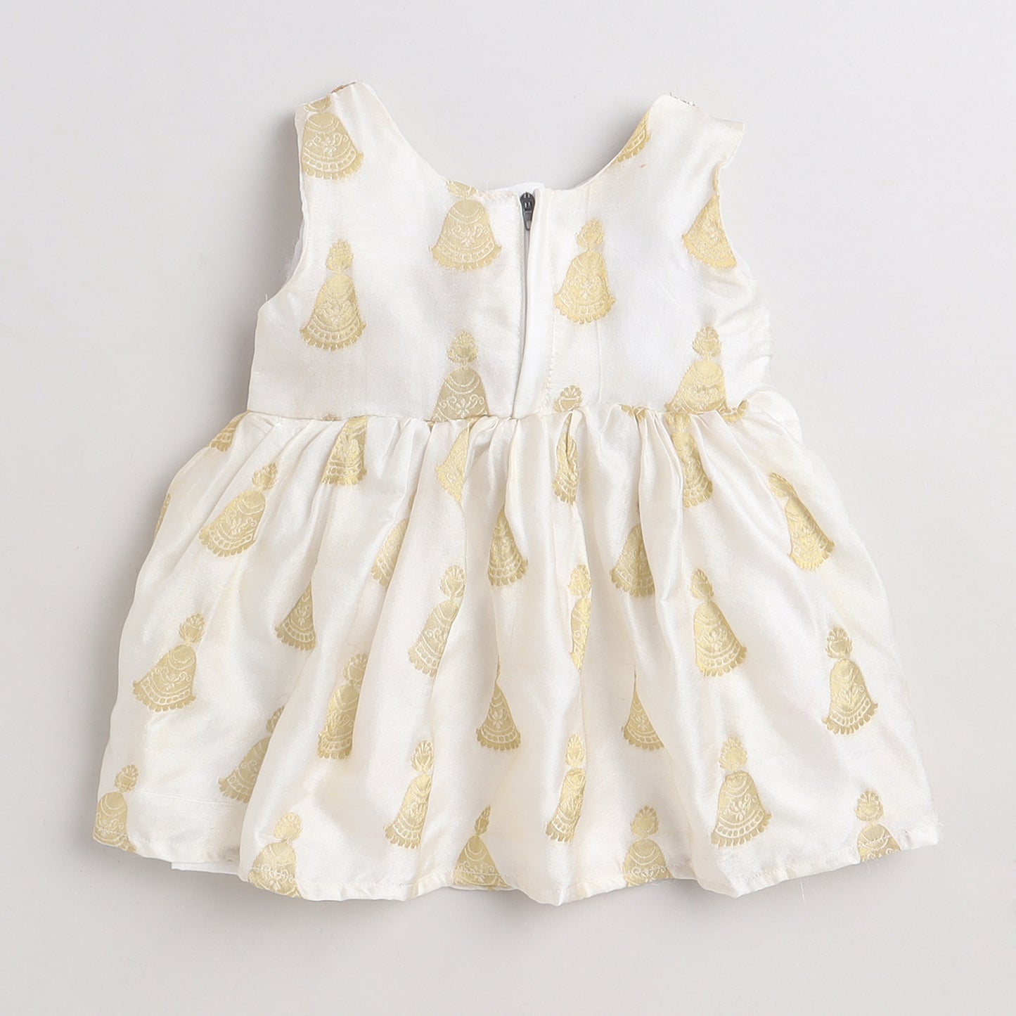Many Frocks golden jhumka weaving knee length baby Onam dress- Cream